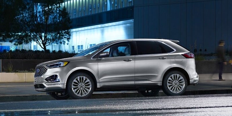 Gray 2024 Ford Edge standing outside home